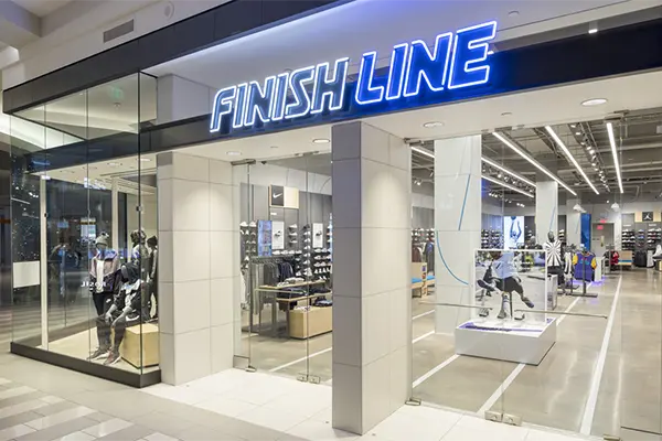 Entrance view of a Finish Line retail space glass holding system