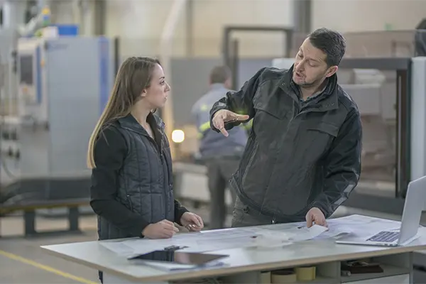 Coworkers discussing the development process