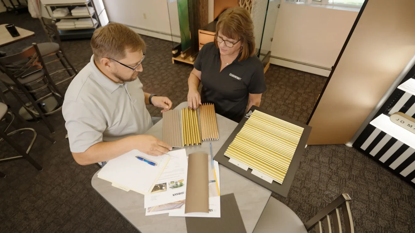 Arial view of coworkers comparing certain products